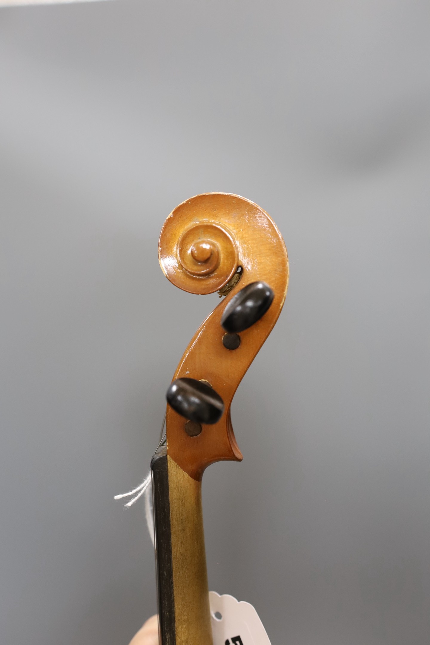 A cased 20th century Romanian violin, back measures 35.5cm excl button